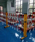 Heavy Duty Expandable Telescopic Barrier With Rolls Like Butter Stoppable Wheels Adjustable Retractable Traffic Fence in a large indoor space.