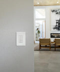 Smart Battery-Powered Multi-Room Scene Keypad For Home Lighting, White, Bluetooth Enabled, installed on living room wall
