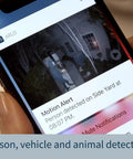 Smartphone displaying Pro 4 Spotlight Camera 1 Pack Wireless Home Security With 2K HDR video alert notification.