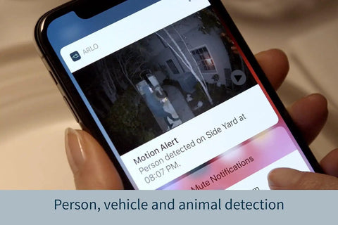 Smartphone displaying Pro 4 Spotlight Camera 1 Pack Wireless Home Security With 2K HDR video alert notification.
