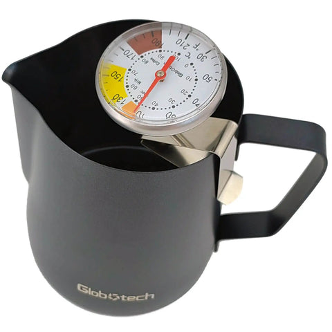 Milk Frothing Thermometer For Coffee And Chocolate Pro Grade Stainless Steel Temp Gauge clipped to black espresso pitcher