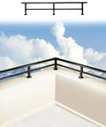 Solid Setup Balcony Railing Height Extender For Temporary Outdoor Security Upgrades With Hella Tough Horizontal Guardrail System in matte black against a scenic sky.