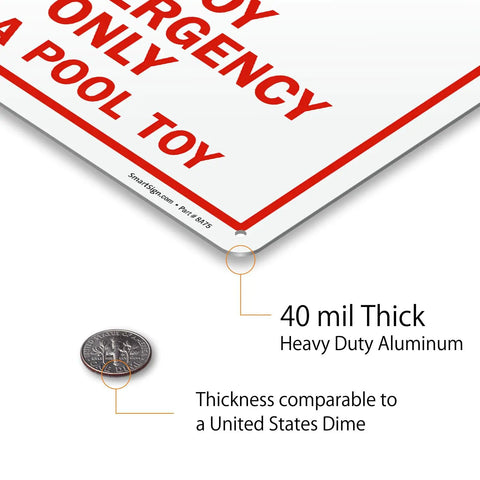 Close-up of the Ring Buoy Emergency Use Only Sign Not A Pool Toy 10 X 14 Aluminum Heavy Duty 40 Mil Rustproof with thickness comparison to a dime.