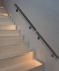 Heavy Duty Wall Mount Stair Handrail In Sleek Black Stainless Steel delivers solid grip and dependable support for indoor steps.