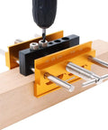 Self Centering Doweling Jig Kit For 6 Inch Dowel Jig With 6 Drill Guide Bushings clamped on wood for precise holes