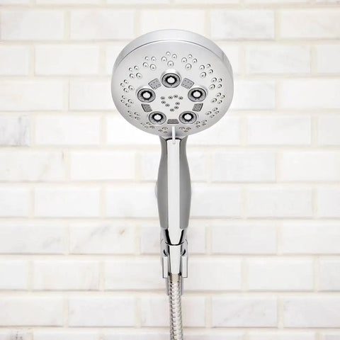 Rio Multi-Function Handheld Shower Head With Hose, Polished Chrome Finish, 5 Spray Settings, Detachable Design against tiled wall