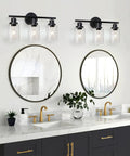 Modern 3 Light Vanity Light Fixture In Black With Clear Glass Shades above double bathroom mirrors, E26 base, easy install