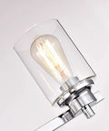Close-up of a single bulb in the 3 Light Chrome Vanity Light Fixtures Over Mirror With Clear Glass Shades Farmhouse Style Wall Sconce