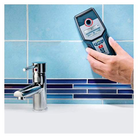 Heavy Duty Digital Stud Finder Wall Scanner With Killer Precision Detection For Wood Copper Pipes Metal And PVC Cavity Scan in hand near faucet.