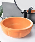 Round Sink Bowls For Bathroom Vessel Sink, 15.7 Inch Ceramic Vessel Sink in orange with faucet by mirror.