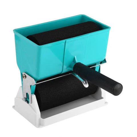 Handheld Adhesive Roller Knock Out Any Woodworking Or Crafting Job Smooth Operator Glue Spreader with blue handle and black rollers.