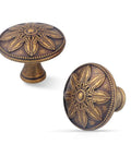 Antique Brass Cabinet Knobs Set Of 4 1.4 Inch Round Vintage Dresser Drawer Handles For Cabinets And Furniture Rustic Flower Shaped Design Durable Zinc Alloy Finish showing two knobs with floral pattern