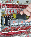 Using Multi Bit Screwdriver And Nut Driver 6 In 1 Set With Extended Reach installing in electric panel, showing slim grip handle.