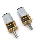 Compact N20 Dc Motor With 6V Miniature Gear Reducer, two motors with metal casing and gears for robotics projects.