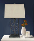 Metal Table Lamp With A Stacked Rectangular Base, Dope Scrollwork, And A Rectangular Shade For Modern Home Decor on nightstand