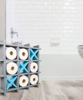 Gray Wooden Toilet Paper Holder With Tic Tac Toe Shelves, freestanding by the wall, holding rolls, in a bathroom.