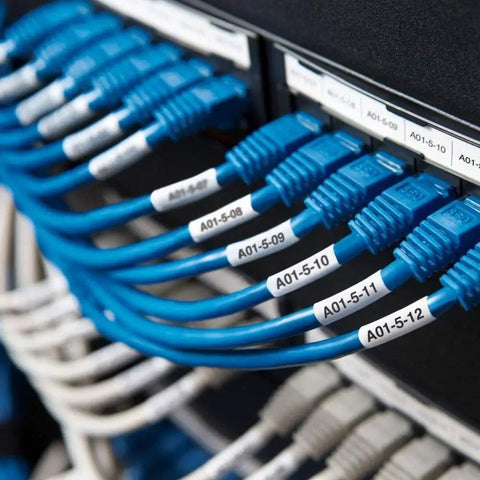 Rock Solid Heavy Duty Heat Shrink Cable Markers 3 Pack on blue Ethernet cables in network rack for identification.