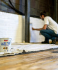 Built Tough Liquid Rubber Waterproofing Coating For Concrete Foundations And Basements Rock Solid Elastomeric Sealant One Gallon container on floor.