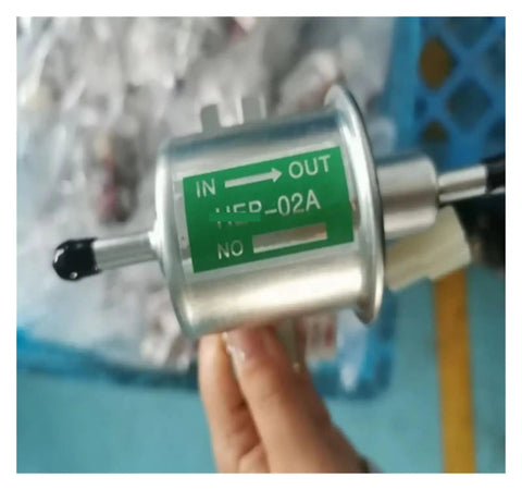 12 Volt Universal Electric Fuel Pump HEP02A Low Pressure Inline Assembly with green label showing 'IN' and 'OUT' directions.