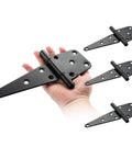 4 pack of 6 Inch T Strap Gate Hinges Heavy Duty With Screws, black coated steel, shown in hand, for outdoor barns gates and wooden fences.