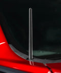 Close-up of 6 3/4 Inch Short Rubber Antenna Replacement for Toyota Tacoma 1995 2015 Truck, installed on red vehicle.