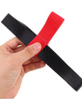 Hand holding a red Scuba Tank Side Mount Strap Carrier For Quick Attachment And Detachment, Rock Solid Rubber Dive Gear Built For Snorkeling And Surfing.