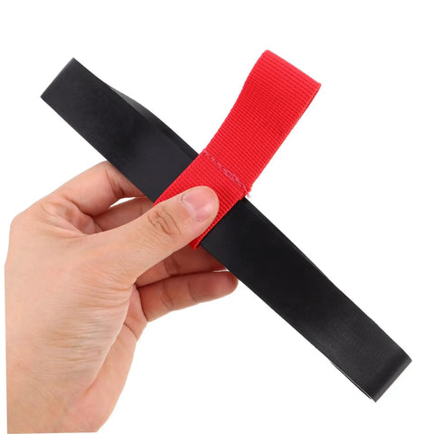 Hand holding a red Scuba Tank Side Mount Strap Carrier For Quick Attachment And Detachment, Rock Solid Rubber Dive Gear Built For Snorkeling And Surfing.