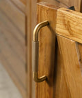 Six Pack 5 Inch Champagne Bronze Knurled Cabinet Pulls With Crosshatch Knurling on wooden cabinet door