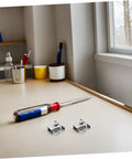 Heavy Duty Stainless Steel Cabinet Door Latch Set with Double Roller Catch and screwdriver on desk