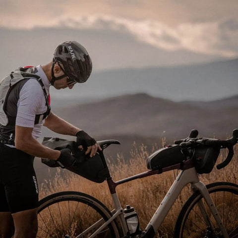 Handlebar Bag For Bicycles Waterproof Front Frame Storage Pouch 3.5L used on a bicycle by a cyclist in outdoor setting