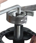 Close-up of Floor Type Compact Metal Bender With 38 Inch Stand And Large Base Plate 14 Dies showing bending process for workshop use