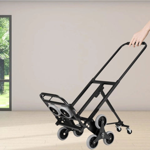 Stair Climbing Folding Cart Hand Truck With Heavy Duty Carbon Steel Frame And Rubber Wheels, black stair-climbing cart folded on floor