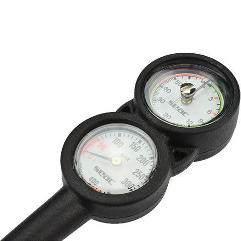 Console 2 Dive Pressure And Depth Gauge With 0 To 5000 Psi Readout, chrome plated brass case, close-up of gauges and polycarbonate lens.