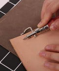 Using 7 In 1 Pro Adjustable Stitching Groover Kit for leathercraft on tan leather, detailing grooves with precision tool.