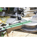 Close-up of Pro Grade Miter Saw With Eight And A Half Inch Blade And Linear Ball Bearing Slide System on a work site.