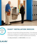 EZH2O Bottle Filling Station With Bi Level ADA Cooler Filtered Non Refrigerated Stainless Steel Hydration Station Featuring Touchless Sensor Sleek 1.5 GPM Fill Rate And LED Filter Status Indicator installed in a hallway setting with lockers.