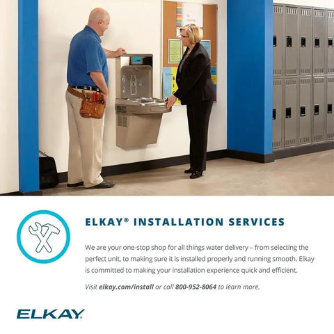 EZH2O Bottle Filling Station With Bi Level ADA Cooler Filtered Non Refrigerated Stainless Steel Hydration Station Featuring Touchless Sensor Sleek 1.5 GPM Fill Rate And LED Filter Status Indicator installed in a hallway setting with lockers.