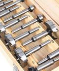 Top Shelf 16 Piece Wood Drill Bit Set With Tungsten Carbide Tips, featuring various sizes in a wooden storage box.