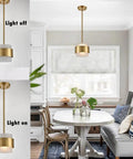 Gold Pendant Light Fixture With Frosted Glass Shade for kitchen island and dining room modern rod hanging lamp in room setting.
