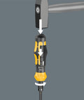 Impact action of Kraftform Kompakt 900 Imperial Impact Screwdriver Set, 19 Piece Kit, with hammer hitting black and yellow handle.