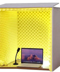 Hella Effective Portable Soundproof Booth With Foldable Acoustic Foam Panels For Desktop Recording Studio Noise Blocking Vocal Shield And Mic Setup featuring yellow foam interior and laptop.