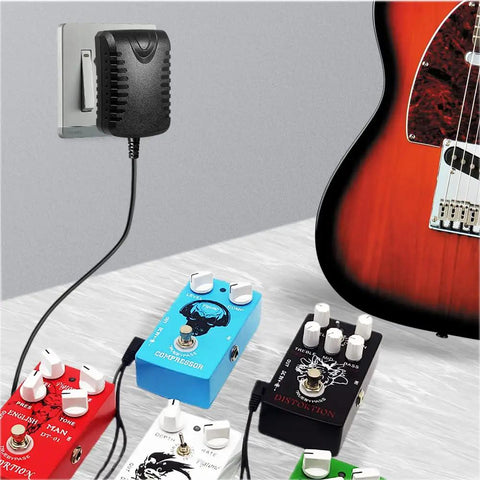 9V DC 1A Power Supply Adapter For Guitar Effects Pedals Center Negative Tip with connected colorful guitar pedals