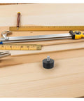 32 Pcs Adjustable Rubber Furniture Levelers With M6 Threaded Screws on wooden table with measuring tools in background