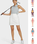 Model wearing Women's Golf Skort With Built In Shorts, Moisture Wicking Quick Dry Nylon, UPF 50 Plus Sun Protection, White, Size M.