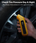 HYVOHEX digital tire pressure gauge, yellow with LED display, front view used on car tire valve