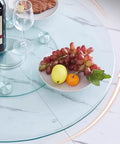 Heavy Duty Tempered Glass Lazy Susan Turntable 32 Inch Round Rotating Tray with fruits and wine on kitchen table
