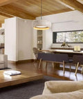 Modern Dome Yellow Travertine Pendant Light over a dining area showcasing a natural stone design in a cozy living space.