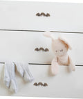 White cabinet with Old School Vintage Zinc Alloy Cabinet Knobs And Drawer Pulls Set 56x17mm Retro Decorative Handles and a plush toy