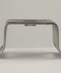 Stainless Steel Bull's Eye Sign Mounting Brackets With Flared Leg No Bolt Or Washer 3/4 Inch Slot Ideal For Traffic Signs And Security Cameras 50 Per Box, side view showing flared leg design