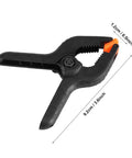3 Inch Plastic Spring Clamps With Killer Anti Slip Grip Heavy Duty Woodworking And Backdrop Clips Hella Handy For Crafts Home Diy Total Flexible Tool Built Tough For Quick Projects black plastic clamp with orange detail and ridged grip